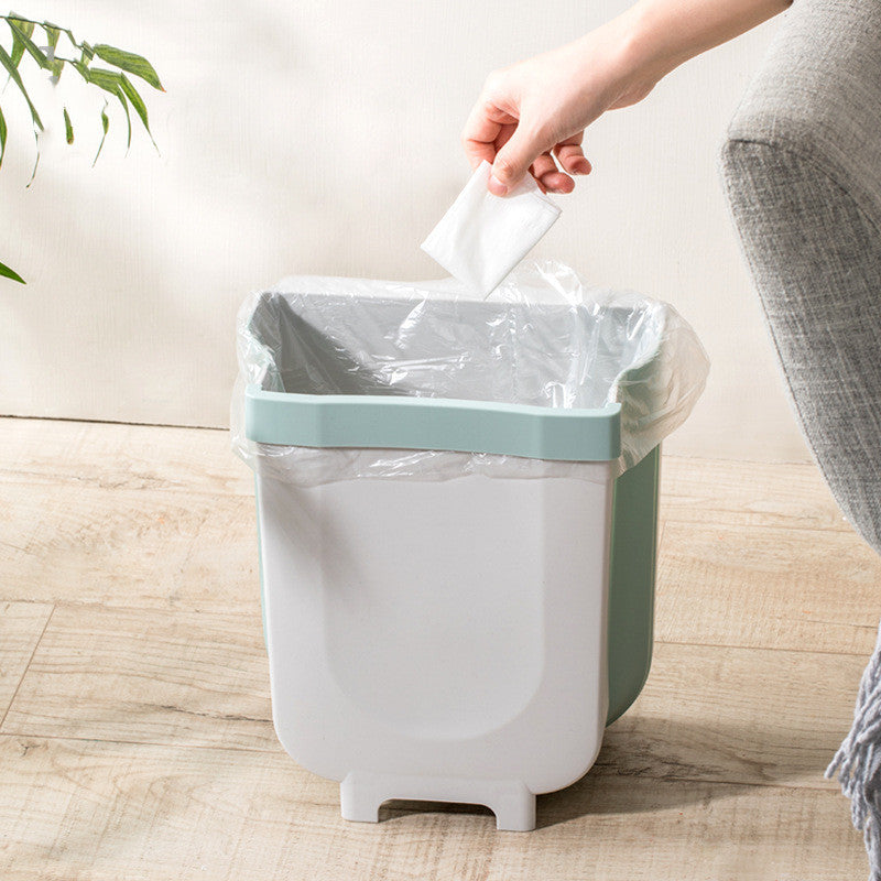 Sammenklappelig skraldespand til skabslåge