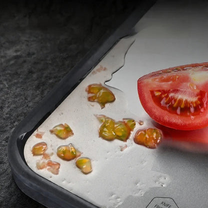 Vendbart skærebrætsæt i stål og marmor 